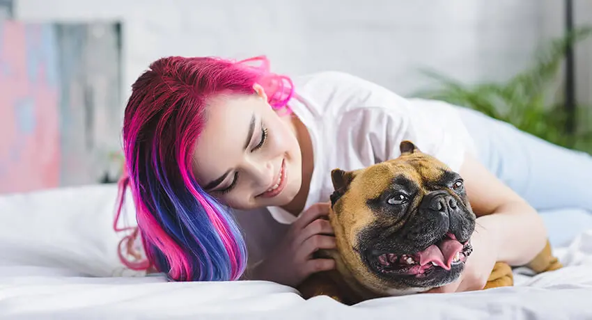  Dog and human in a bed