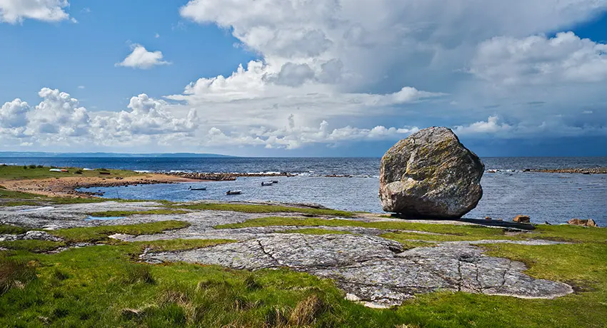 Big rock on coast by the sea